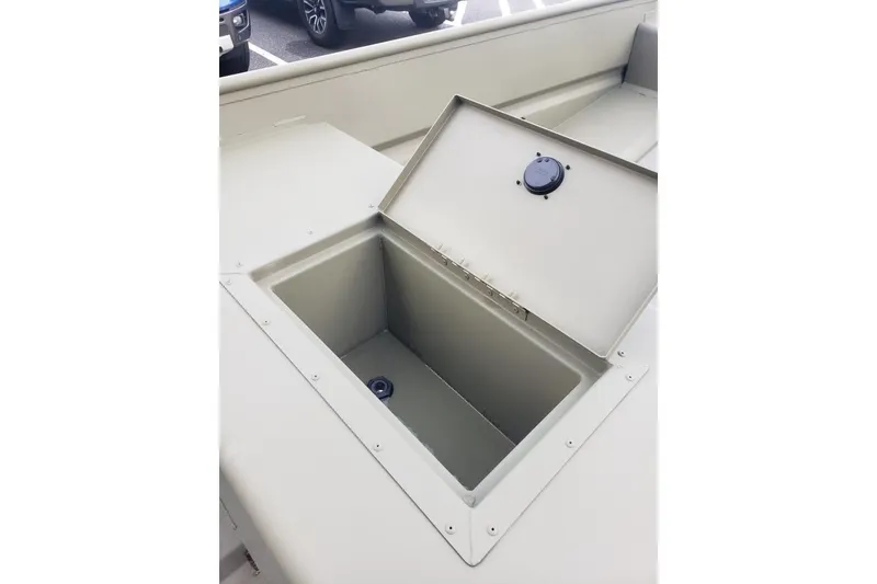 Slide: The Image of Open storage compartment on 2026 Tracker Grizzly 15 Jon boat. - 4