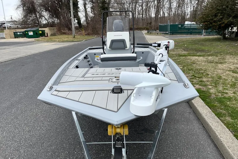 Slide: The Image of 2026 Tracker Bass Tracker Classic CC boat on trailer, parked on a road. - 3