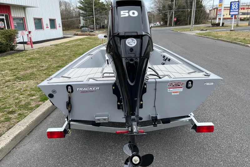 Slide: The Image of 2026 Tracker Bass Tracker Classic CC boat with 50 HP motor on trailer. - 4