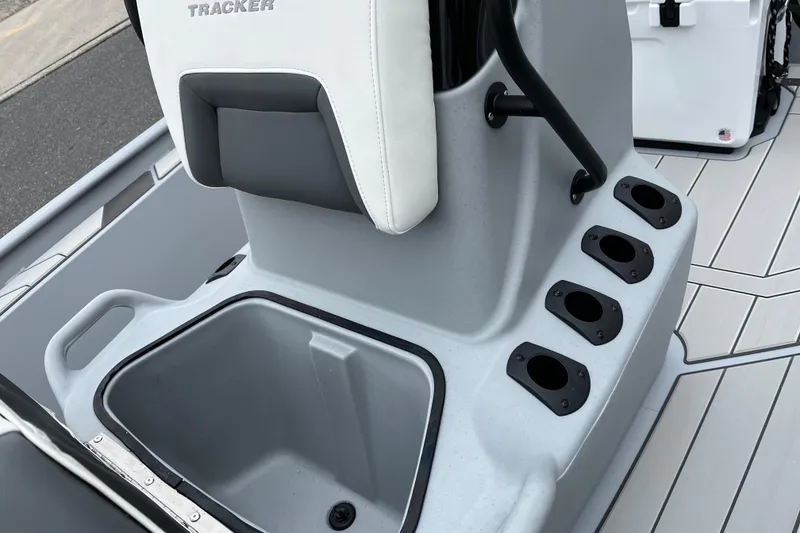 Slide: The Image of 2026 Tracker Bass Tracker Classic CC boat seat and rod holders on deck. - 8