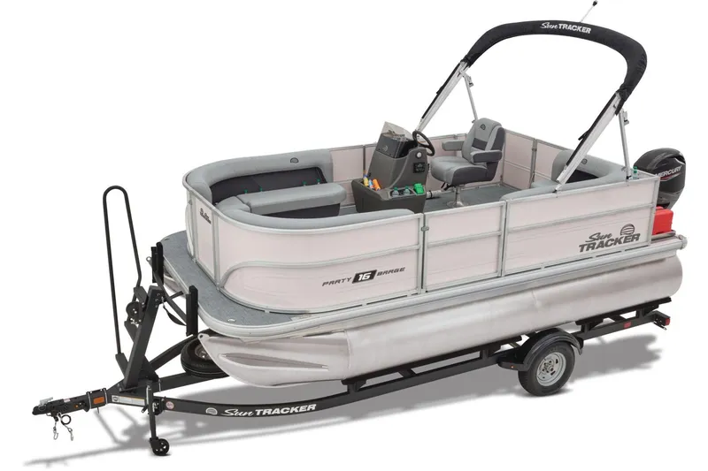 Slide: The Image of Steering console of 2026 Sun Tracker Party Barge 16 DLX with cup holders and controls. - 12