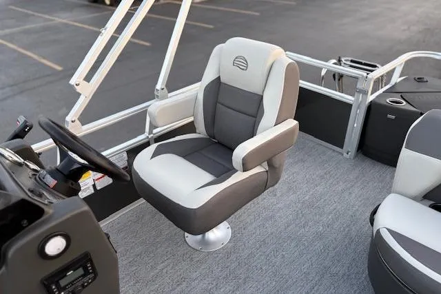 Slide: The Image of 2026 Sun Tracker Bass Buggy 18 DLX boat interior with comfortable captain's chair. - 17