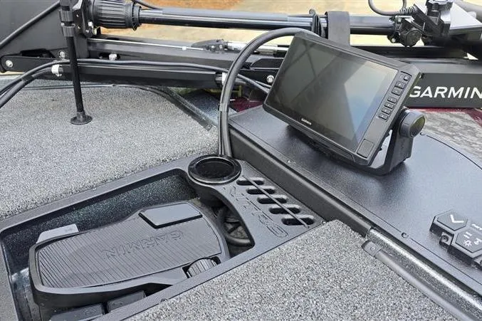 Slide: The Image of 2026 Nitro Z20 XL Pro boat dashboard with Garmin navigation system and foot pedal controls. - 7