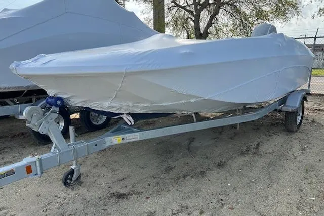 The Image of Covered Bayliner Element E18 boat on trailer, year 2026. - 0