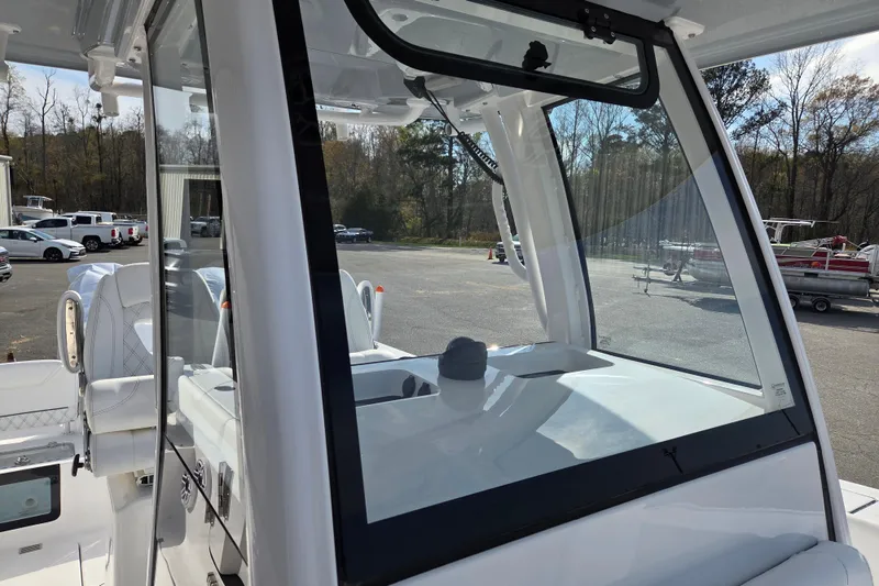 Slide: The Image of 2026 Sportsman Heritage 261 Center Console boat with sleek design and modern features. - 15