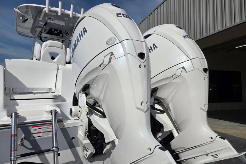 Slide: The Image of 2026 Sportsman Heritage 261 Center Console with dual Yamaha outboard engines. - 6