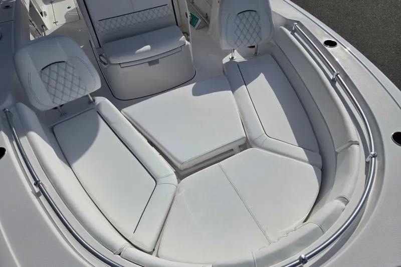 Slide: The Image of Luxurious seating area on 2026 Sportsman Heritage 261 Center Console boat. - 8