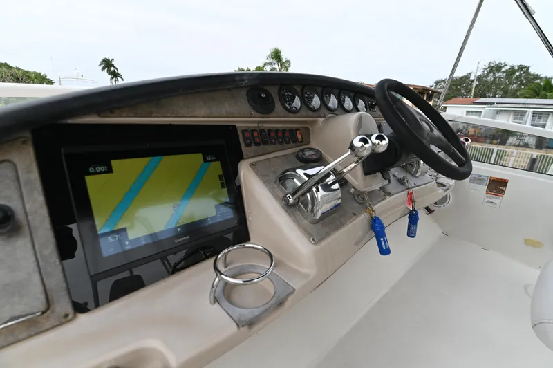Slide: The Image of 2005 Carver 36 Super Sport helm with navigation system and controls. - 5