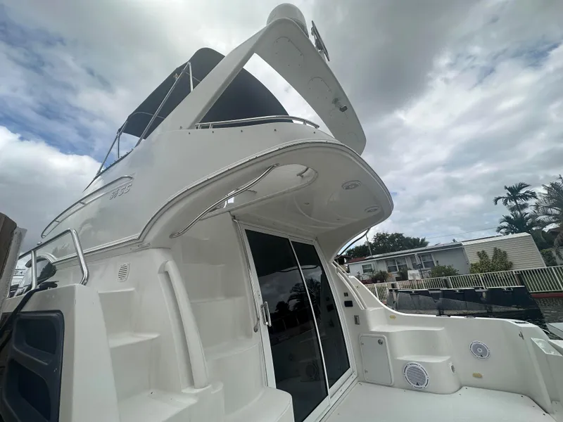 Slide: The Image of 2005 Carver 36 Super Sport yacht with flybridge and sliding glass doors. - 9