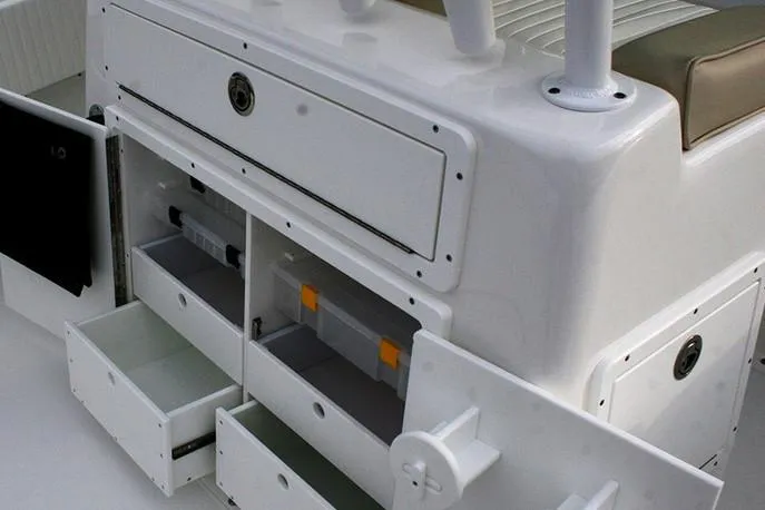 Slide: The Image of Manufacturer Provided Image: 2026 Cape Horn 24 OS boat storage compartments with open drawers and seating. - 11