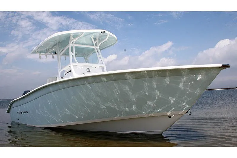 Slide: The Image of Manufacturer Provided Image: 2026 Cape Horn 24 OS boat on water, clear sky background. - 3