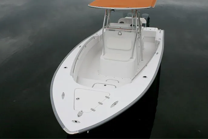 Slide: The Image of Manufacturer Provided Image: 2026 Cape Horn 24 OS boat with sleek design and spacious deck on calm water. - 6