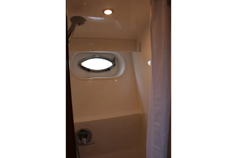 Slide: The Image of Shower area in 2007 Jefferson 45 Motor Yacht with porthole and curtain. - 19