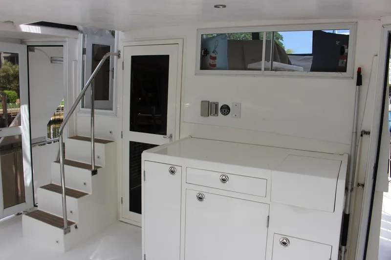 Slide: The Image of Interior of 2007 Jefferson 45 Motor Yacht with stairs and cabinetry. - 6