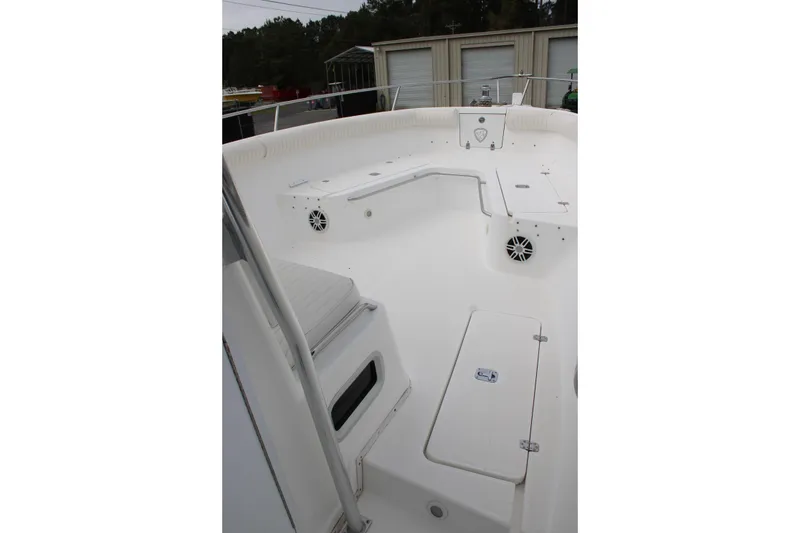 Slide: The Image of Century 3100 boat deck, 2000 model, featuring spacious seating and storage compartments. - 12