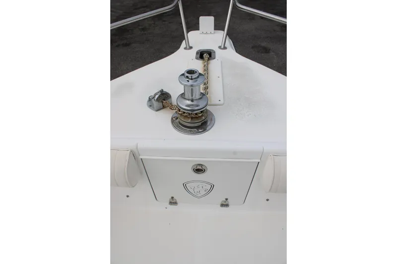Slide: The Image of Bow of 2000 Century 3100 boat with anchor windlass and storage compartment. - 13
