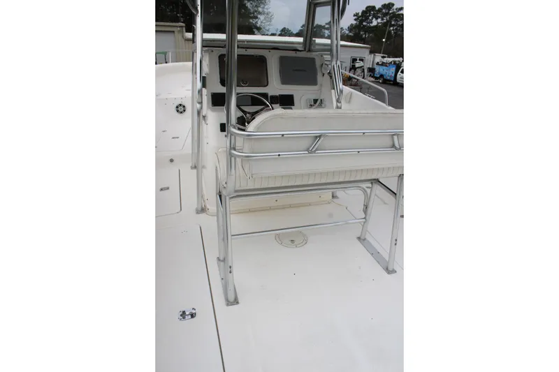 Slide: The Image of Century 3100 boat interior, 2000 model, featuring steering console and seating area. - 25