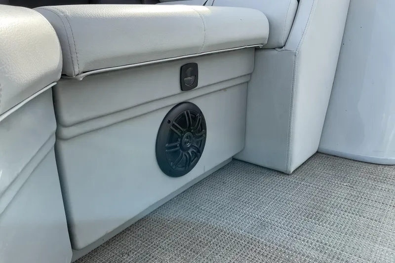 Slide: The Image of 2024 Bentley Pontoons 200 Navigator interior seating with built-in speaker. - 10