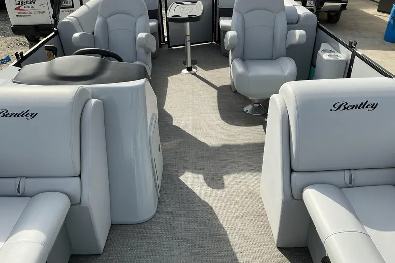 Slide: The Image of 2024 Bentley Pontoons 200 Navigator interior with luxurious seating and modern design. - 8