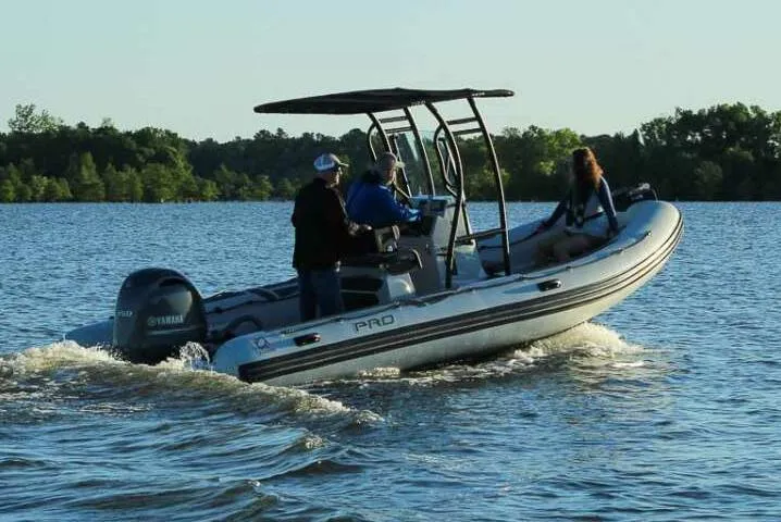 Slide: The Image of Manufacturer Provided Image: Zodiac Pro 6.5 boat 2026 on a calm lake. - 0