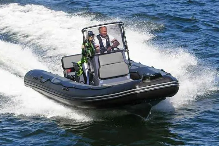 Slide: The Image of Manufacturer Provided Image: Zodiac Pro 5.5 boat 2026 speeding on the water. - 2