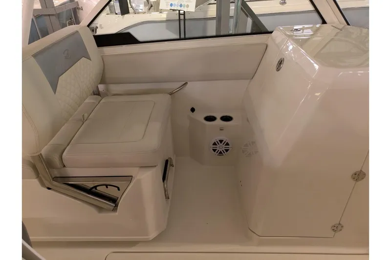 Slide: The Image of Interior of 2025 Sailfish 276 DC boat featuring seating and speaker system. - 15