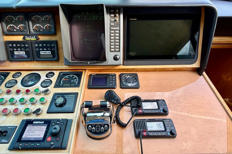 Slide: The Image of Control panel of Horizon 92 yacht with navigation and communication equipment. - 111
