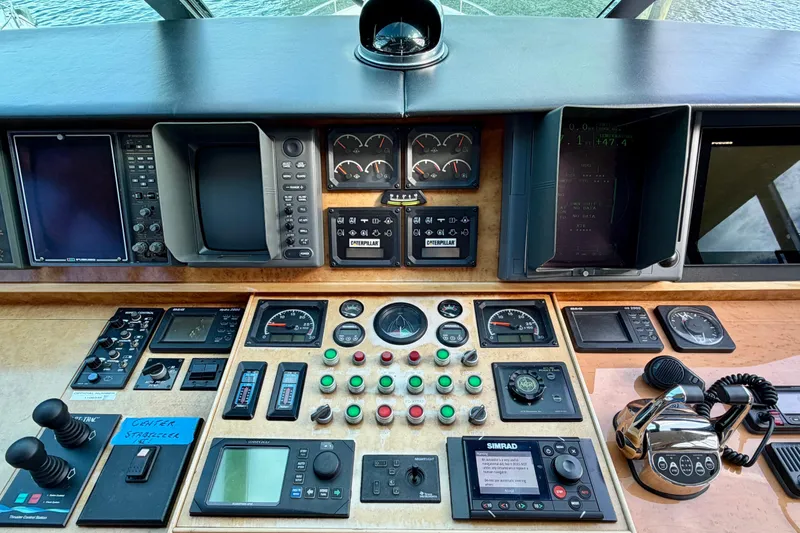 Slide: The Image of Control panel of Horizon 92 yacht with navigation and communication equipment. - 112