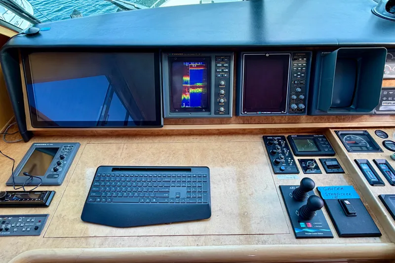 Slide: The Image of Control panel of Horizon 92 yacht with navigation screens and controls. - 113