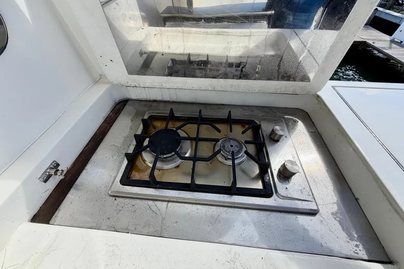 Slide: The Image of Outdoor gas stove on Horizon 92 yacht, featuring two burners and control knobs. - 125