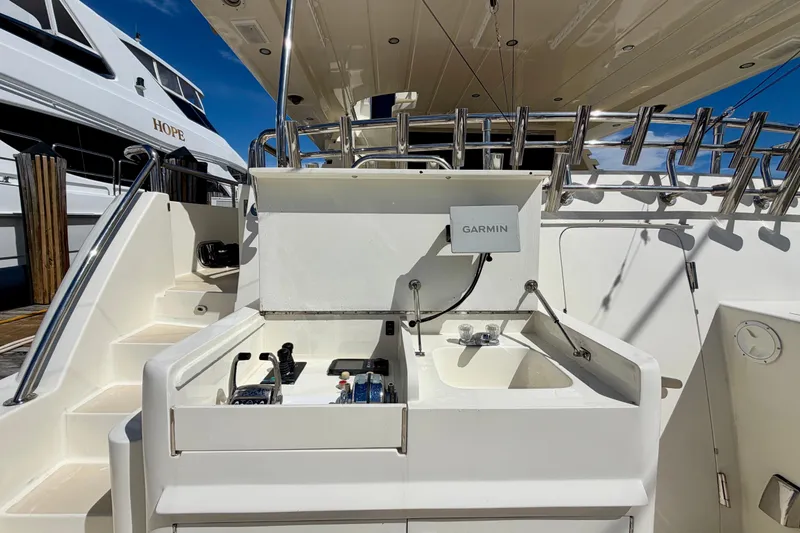 Slide: The Image of Outdoor sink and equipment on Horizon 92 yacht deck, featuring Garmin technology. - 13