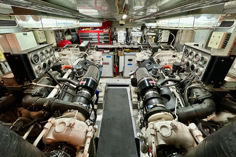 Slide: The Image of Engine room of Horizon 92 yacht with dual engines and control panels. - 138