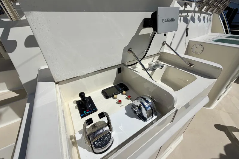 Slide: The Image of Control panel on Horizon 92 yacht featuring Garmin equipment and navigation controls. - 14
