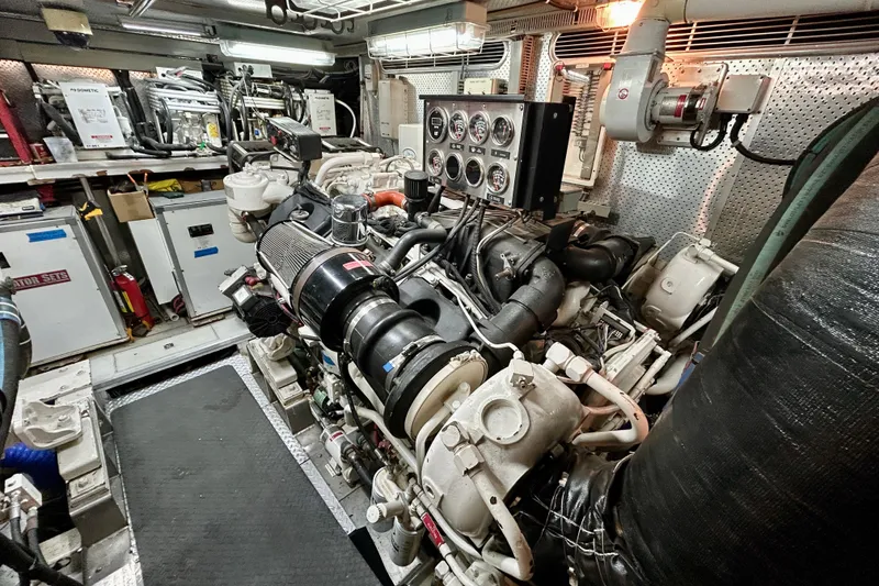 Slide: The Image of Engine room of Horizon 92 yacht with complex machinery and control panels. - 142