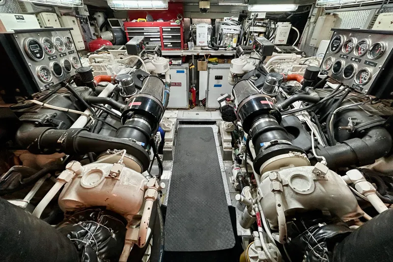 Slide: The Image of Engine room of Horizon 92 yacht with complex machinery and control panels. - 143