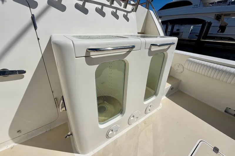 Slide: The Image of Fishing rod holders and storage compartments on Horizon 92 yacht deck. - 15