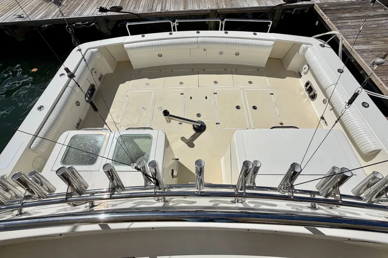 Slide: The Image of Spacious deck of Horizon 92 yacht with fishing rod holders and seating. - 21