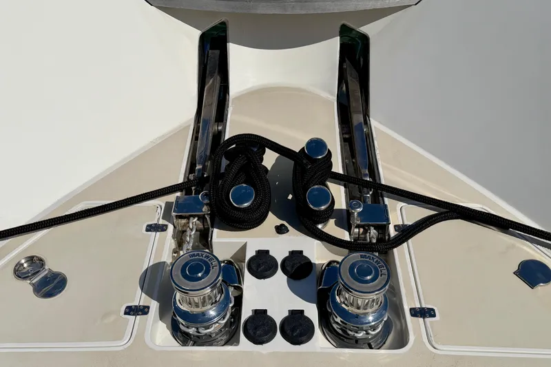 Slide: The Image of Bow of Horizon 92 yacht with winches and black ropes. - 30