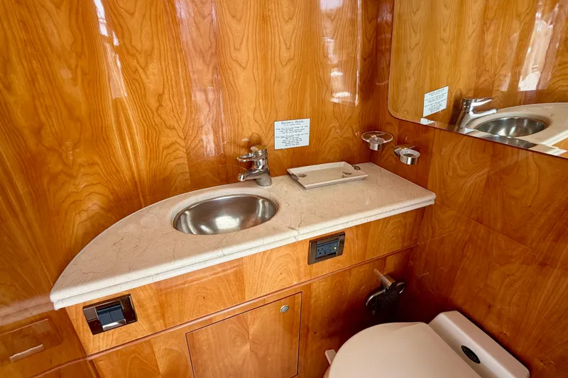 Slide: The Image of Luxurious wooden bathroom interior with marble sink on Horizon 92 model yacht. - 41
