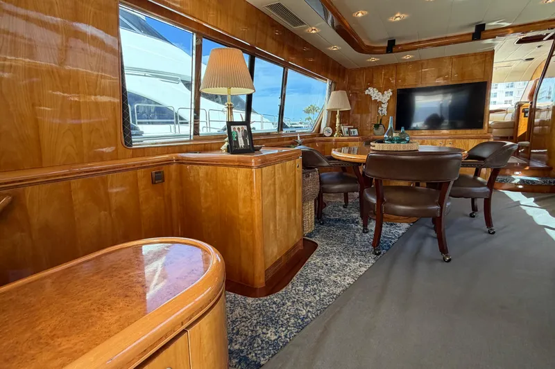 Slide: The Image of Luxurious Horizon 92 yacht interior with elegant wood paneling and modern furnishings. - 45