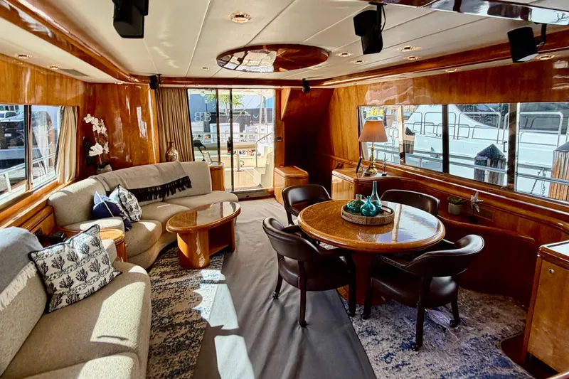 Slide: The Image of Luxurious Horizon 92 yacht interior with elegant wood finishes and comfortable seating. - 50
