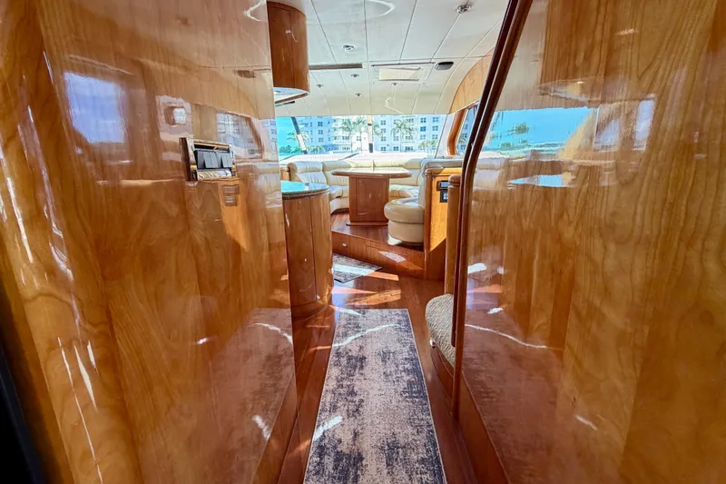 Slide: The Image of Luxurious Horizon 92 yacht interior with polished wood and plush seating. - 53