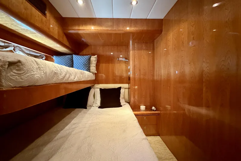 Slide: The Image of Luxurious wooden cabin interior with bunk beds on Horizon 92 yacht. - 97