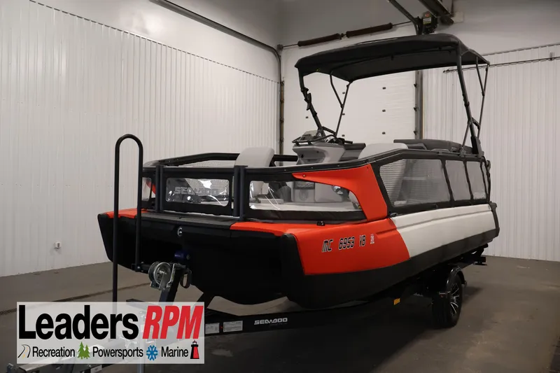 The Image of 2023 Sea-Doo Switch Sport 21 in showroom, featuring sleek design and vibrant colors. - 0