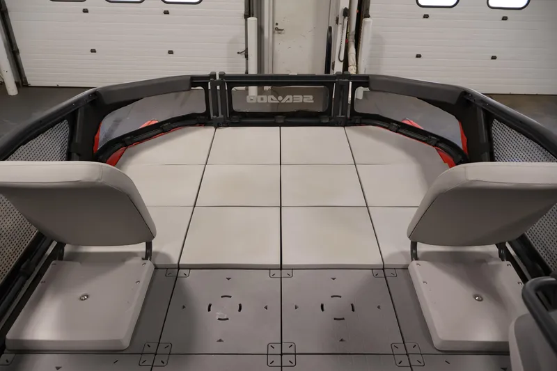 Slide: The Image of 2023 Sea-Doo Switch Sport 21 interior with modular seating and spacious deck layout. - 10