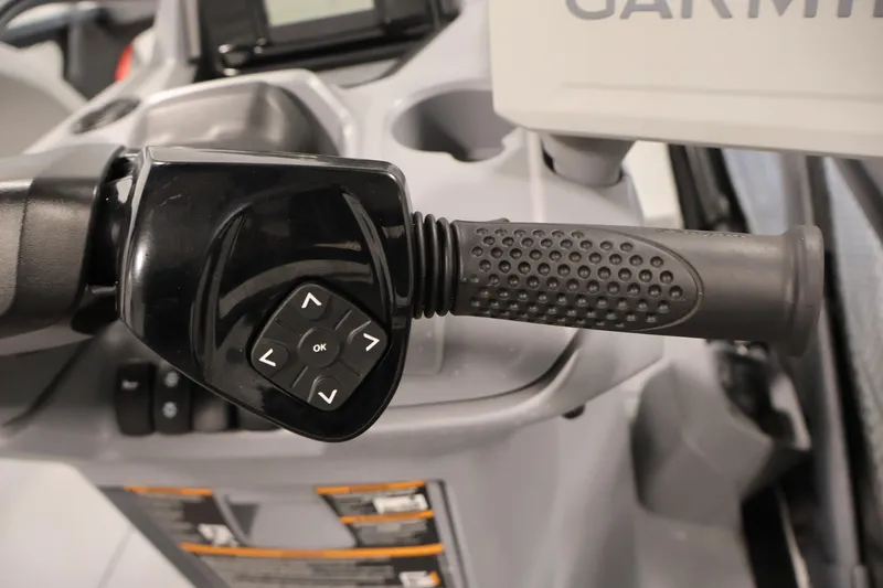 Slide: The Image of Close-up of 2023 Sea-Doo Switch Sport 21 handlebar controls with Garmin display. - 14