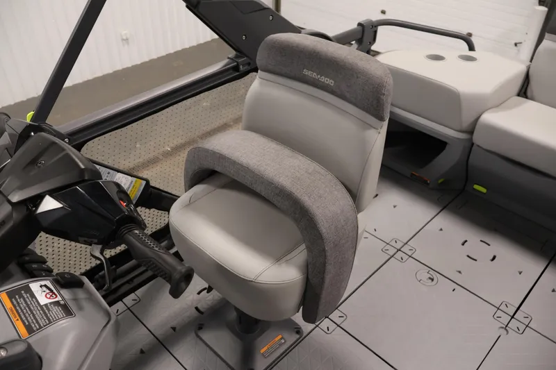 Slide: The Image of 2023 Sea-Doo Switch Sport 21 interior with steering and seating details. - 21