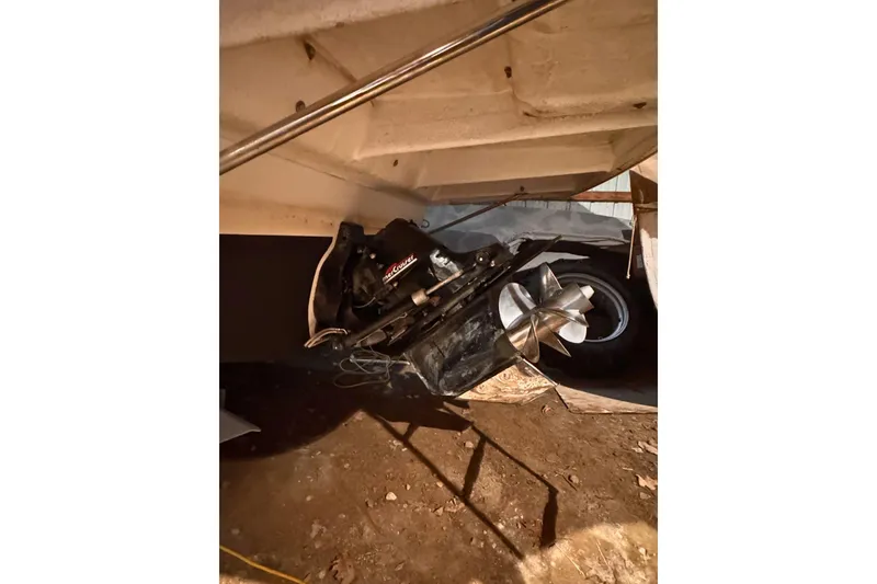 Slide: The Image of 2007 Rinker 270 Express Cruiser boat propeller and stern drive detail. - 4