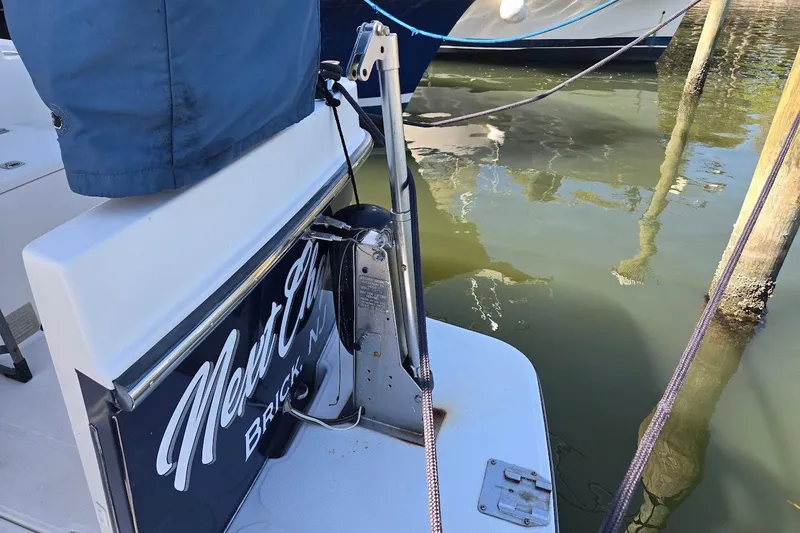 Slide: The Image of American Tug "34" Pilothouse Trawler, 2010, docked with visible stern details. - 102