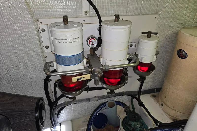 Slide: The Image of Engine room of 2010 American Tug "34" Pilothouse Trawler with fuel filters and piping. - 109